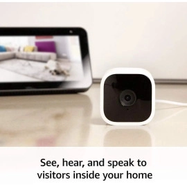 Blink Mini Compact indoor plug-in smart security camera 1080 HD video motion detection Works with Alexa – 1 camera White