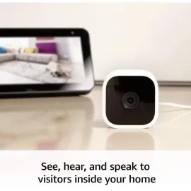 Blink Mini Compact indoor plug-in smart security camera 1080 HD video motion detection Works with Alexa – 1 camera White